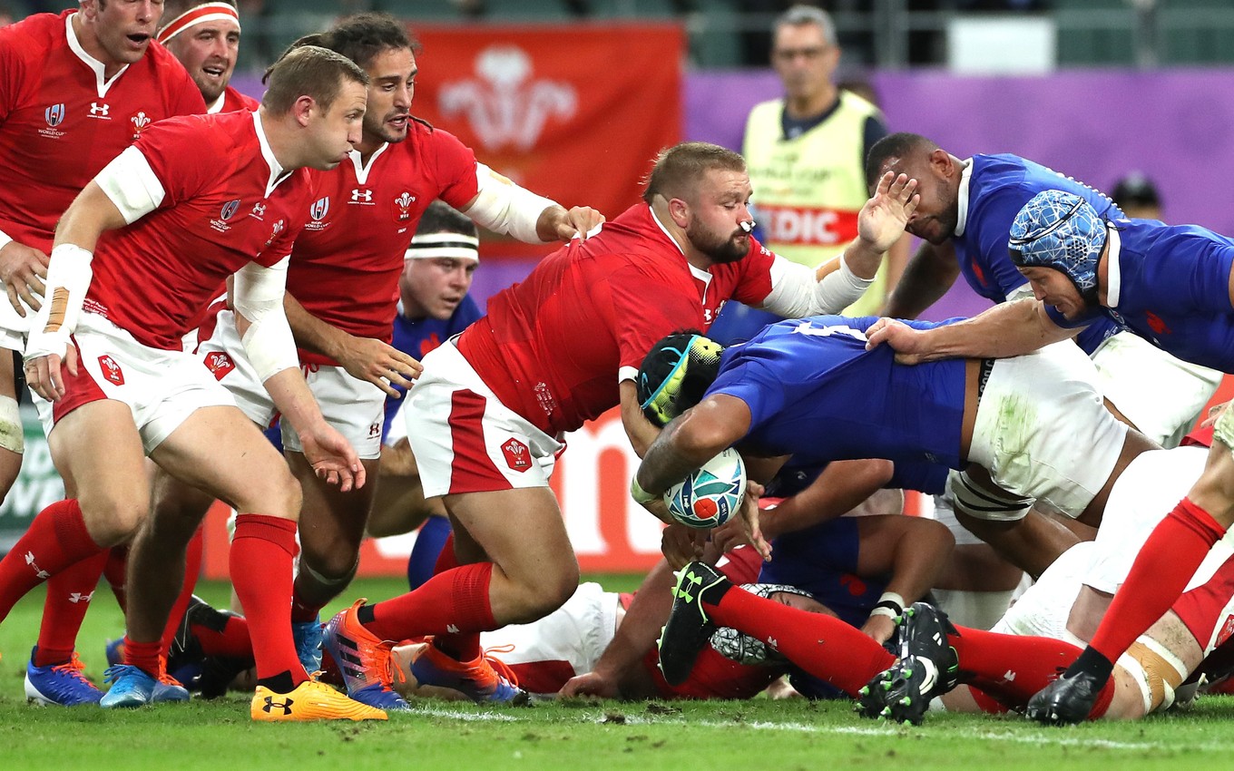 Francis and Wales edge into last four